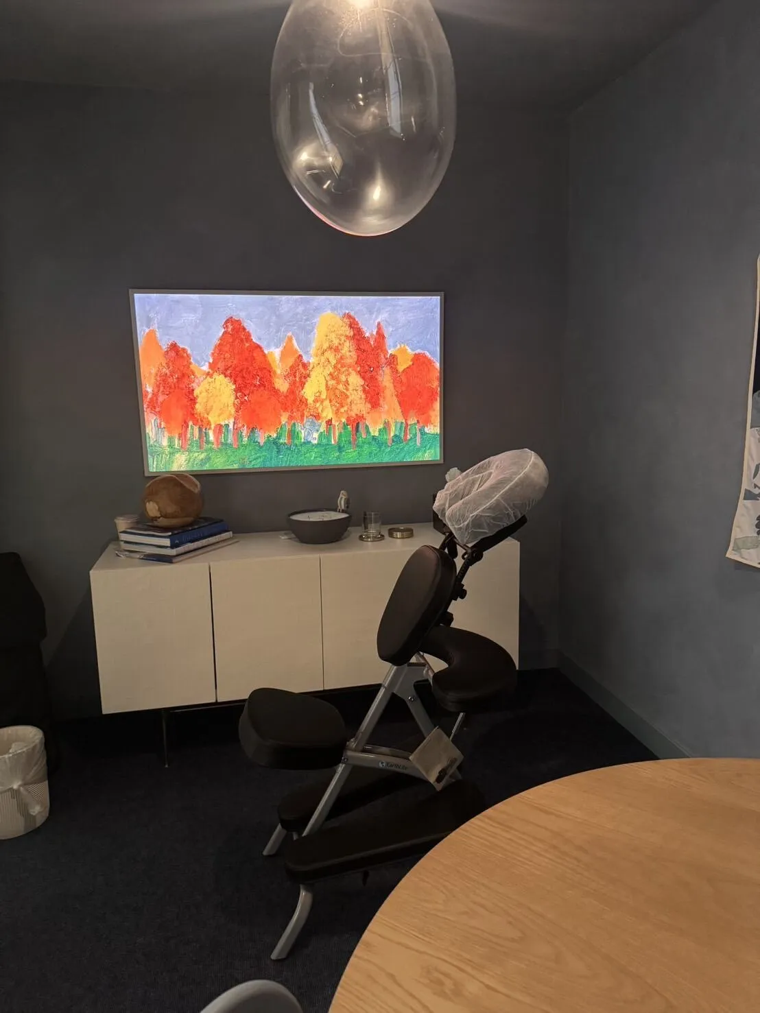 Portable massage chair prepared for an on-site session in a private office