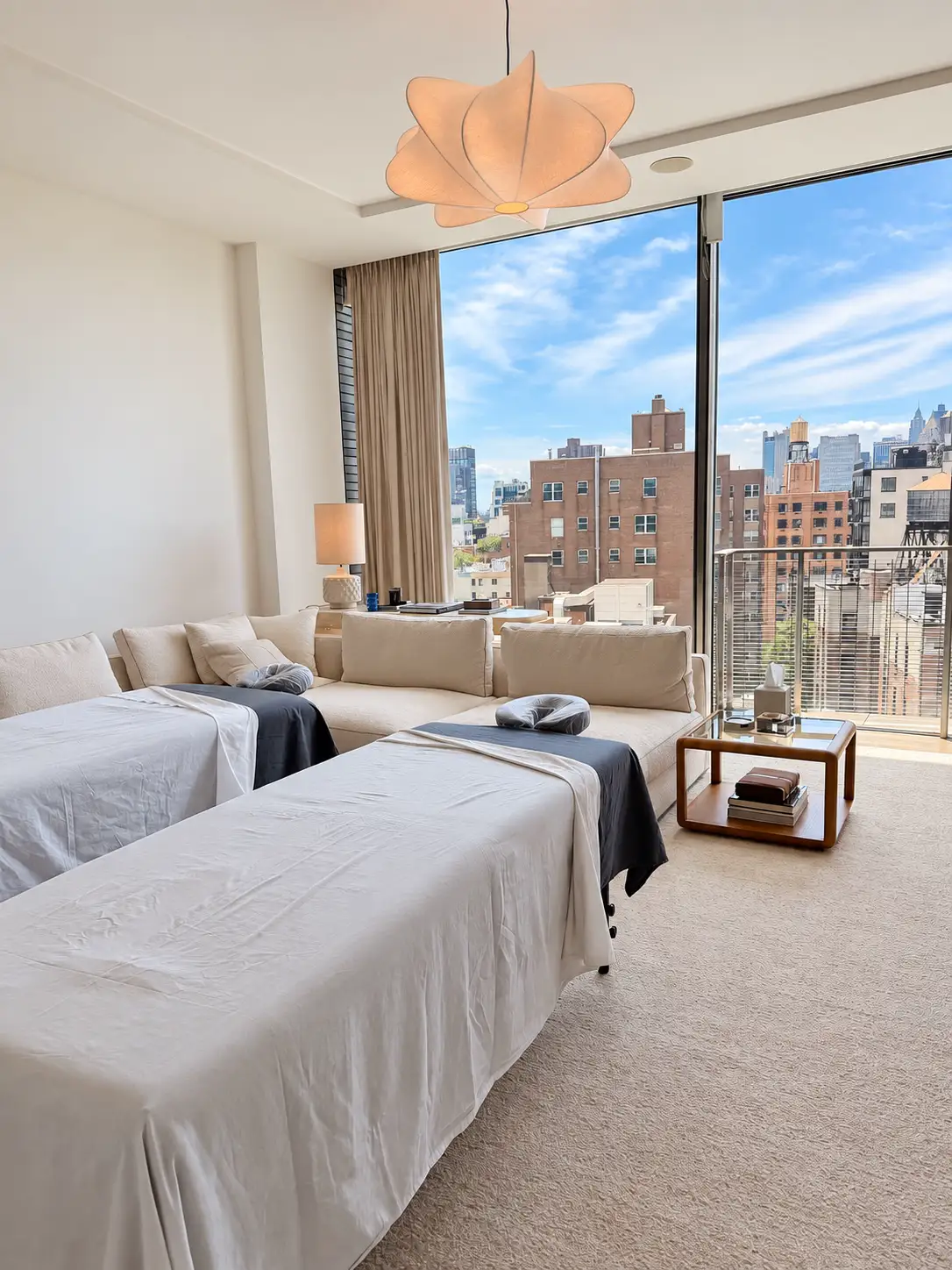 Home - In-Home Massage NYC 2 Two massage tables prepared by Knead NYC in a private residence overlooking Manhattan